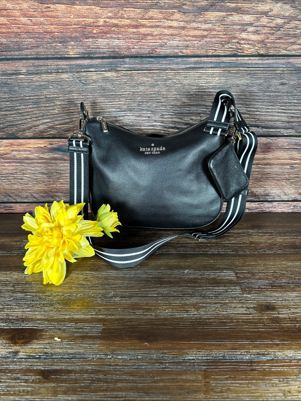 Kate Spade Rosie Pebbled Leather Shoulder Bag featuring a detachable coin purse.